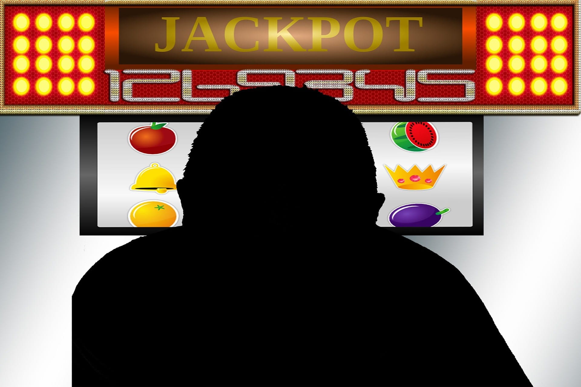 Eine von hinten sichtbare Person sitzt vor einem Glücksspielautomaten.
